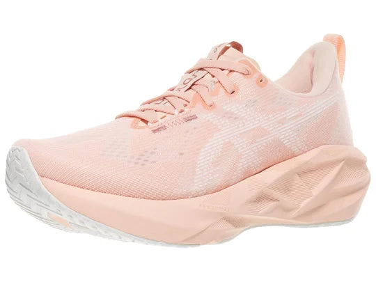 Women's Asics Novablast 5. Off White upper. Off White midsole. Lateral view.