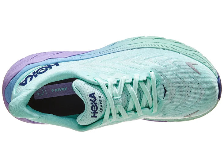 Women's Hoka Arahi 6. Light green upper. Light green/purple midsole. Top view.