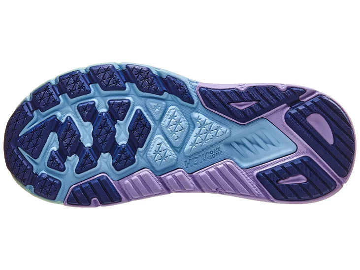 Women's Hoka Arahi 6. Light green upper. Light green/purple midsole. Bottom view.