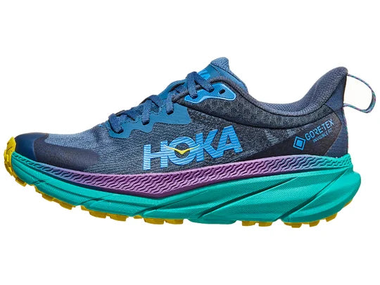 Women's Hoka Challenger 7 GTX. Blue upper. Green midsole. Lateral view.