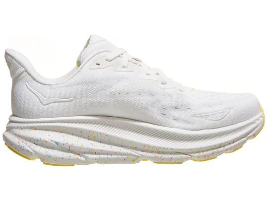 Womens Hoka Clifton 9. White upper. White speckled midsole. Medial view.