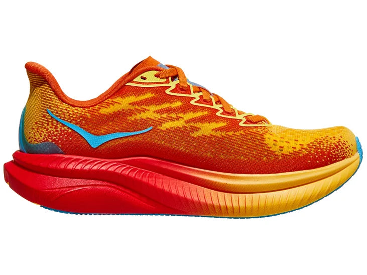 Women's Hoka Mach 6. Orange upper. Orange/Red midsole. Medial view.