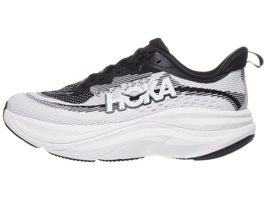 Women's Hoka Skyflow. Black/White upper. White midsole. Lateral view.