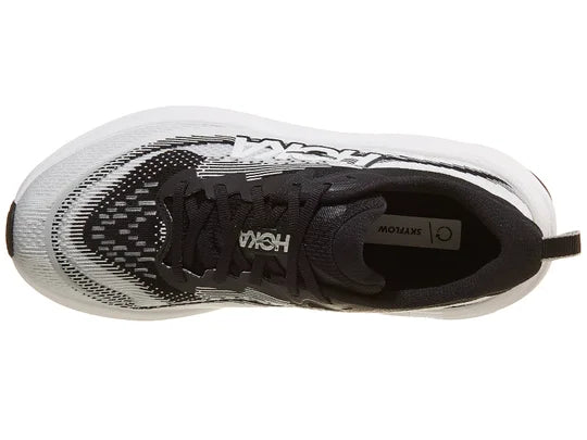 Women's Hoka Skyflow. Black/White upper. White midsole. Top view.