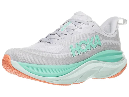 Women's Hoka Skyflow. Light Grey upper. Green/Off White midsole. Lateral view.