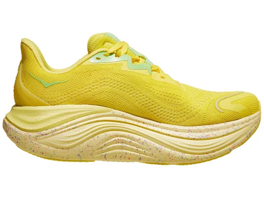 Women's Hoka Skyward X. Yellow upper. Speckled midsole. Medial view.