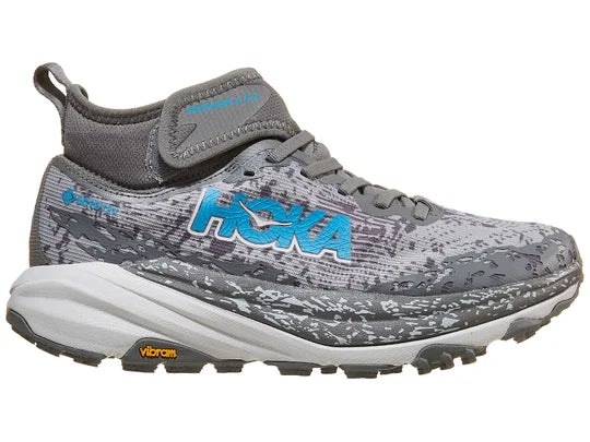 Women's Hoka Speedgoat 6 MID GTX. Grey upper. Grey midsole. Lateral view.