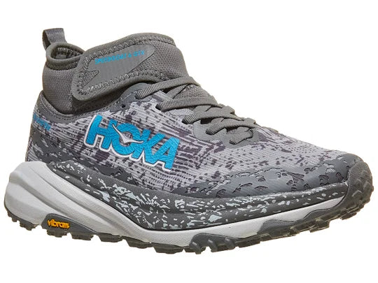 Women's Hoka Speedgoat 6 MID GTX. Grey upper. Grey midsole. Lateral view.