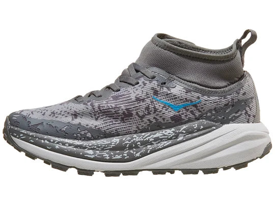 Women's Hoka Speedgoat 6 MID GTX. Grey upper. Grey midsole. Medial view.