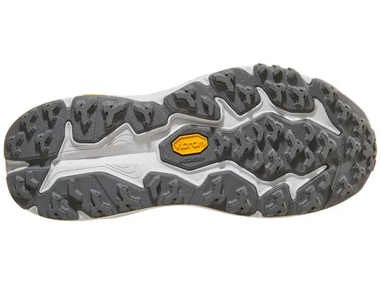 Women's Hoka Speedgoat 6 MID GTX. Grey upper. Grey midsole. Bottom view.