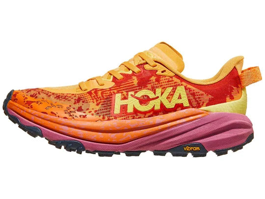 Women's Hoka Speedgoat 6. Red upper. Red/Purple midsole. Lateral view.