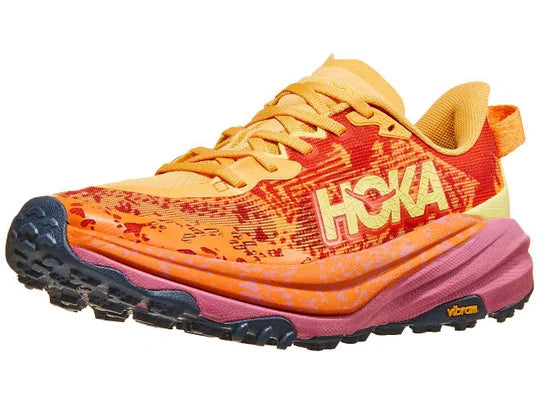 Women's Hoka Speedgoat 6. Red upper. Red/Purple midsole. Lateral view.