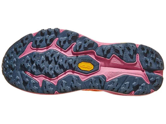 Women's Hoka Speedgoat 6. Red upper. Red/Purple midsole. Bottom view.