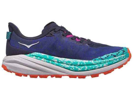 Women's Hoka Speedgoat 6. Blue upper. Grey midsole. Medial view.