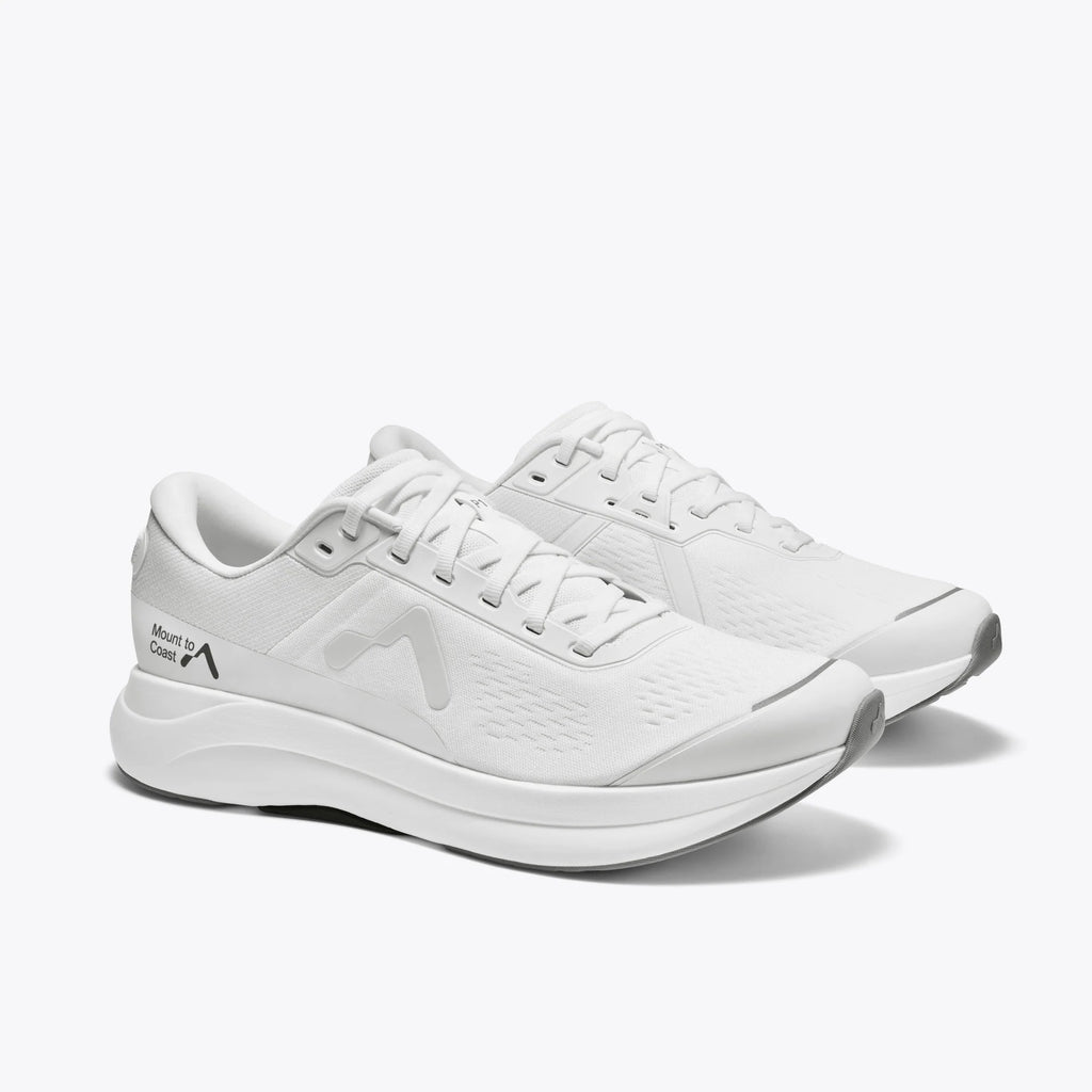 Women's Mount to Coast P1. White upper. White midsole. Lateral view.