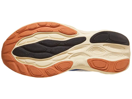 Women's New Balance 1080 v14. Blue upper. Off white, orange, and pink midsole. Bottom view.