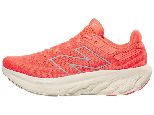 Women's New Balance 1080 V13. Red upper. White midsole. Lateral view.