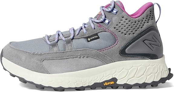 Women's New Balance Hierro MID. Grey upper. Off White midsole. Lateral view.