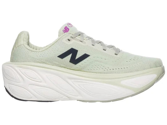 Women's New Balance Fresh Foam X More v5. Light Green upper. White midsole. Medial view.