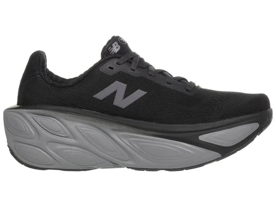 Women's New Balance Fresh Foam X More v5. Black upper. Grey midsole. Medial view.