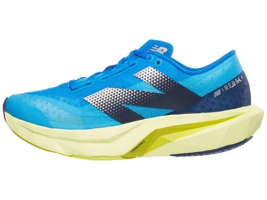 Women's New Balance FuelCell Rebel v4. Blue upper. Green midsole. Lateral view.