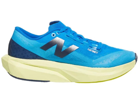 Women's New Balance FuelCell Rebel v4. Blue upper. Green midsole. Medial view.