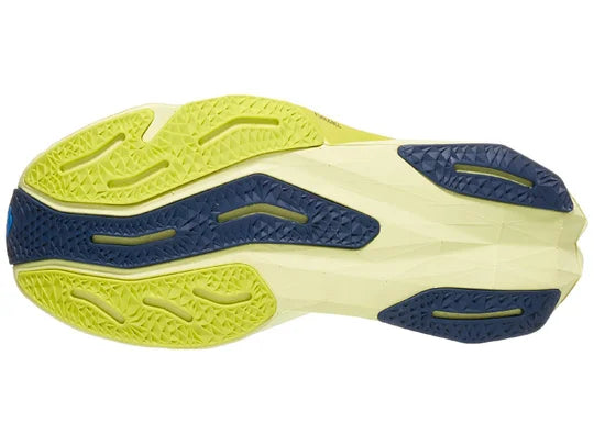 Women's New Balance FuelCell Rebel v4. Blue upper. Green midsole. Bottom view.