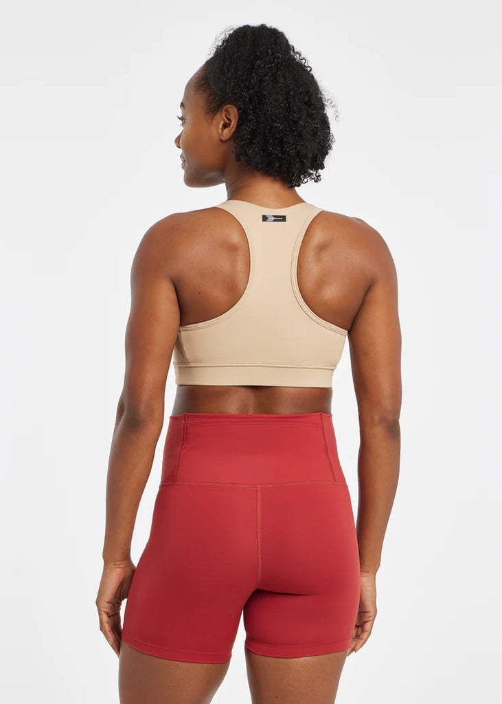 Women's Oiselle Double Breasted Bra. Tan. Rear view.