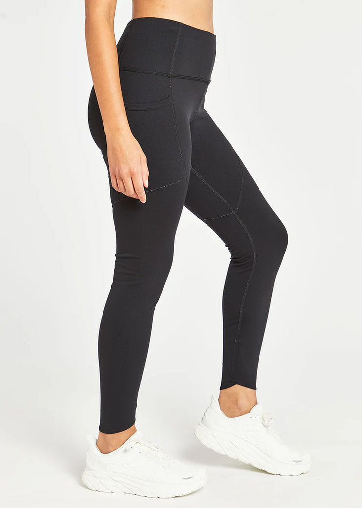 Women's Oiselle Flyout Tights. Black. Lateral view.