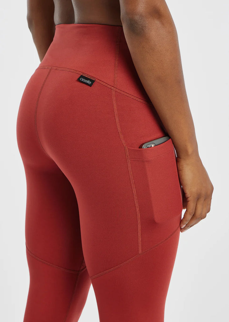 Women's Oiselle Flyout Tights. Red. Rear view.