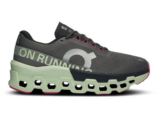 Women's On Running Cloudmonster 2. Dark Grey upper. Green midsole. Lateral view.