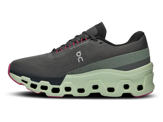 Women's On Running Cloudmonster 2. Dark Grey upper. Green midsole. Medial view.