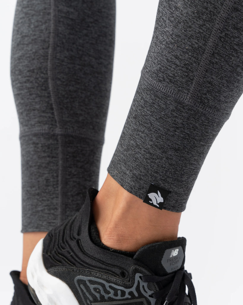 Women's rabbit EZ Tights High Rise. Dark Grey. Ankle closeup.