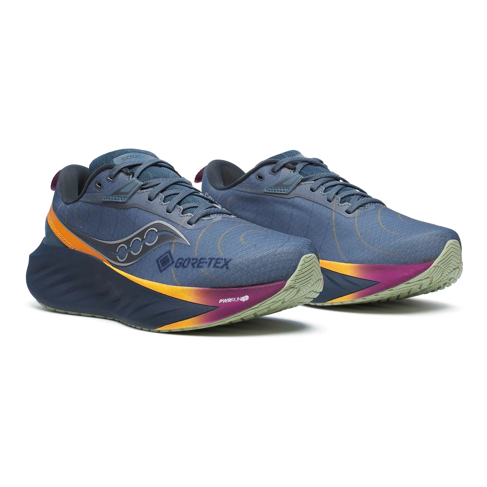 Women's Saucony Triumph 22 GTX. Blue upper. Blue midsole. Lateral view.