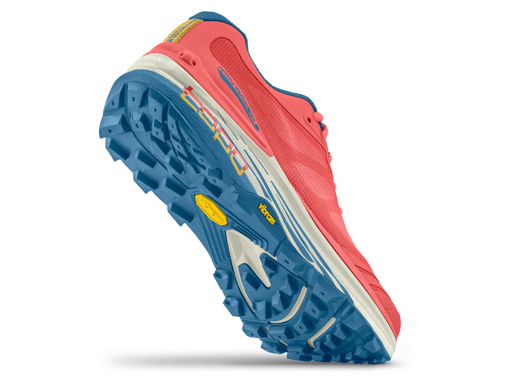 Women's Topo Athletic Mtn Racer 2. Pink upper. Blue/grey midsole. Bottom view.