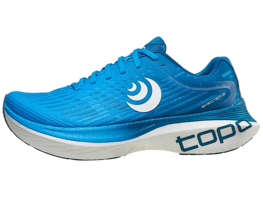 Women's Topo Specter 2. Blue upper. White midsole. Lateral view.