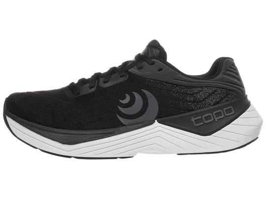 Women's Topo Ultrafly 5. Black upper. White midsole. Lateral view.