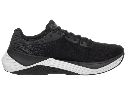 Women's Topo Ultrafly 5. Black upper. White midsole. Medial view.