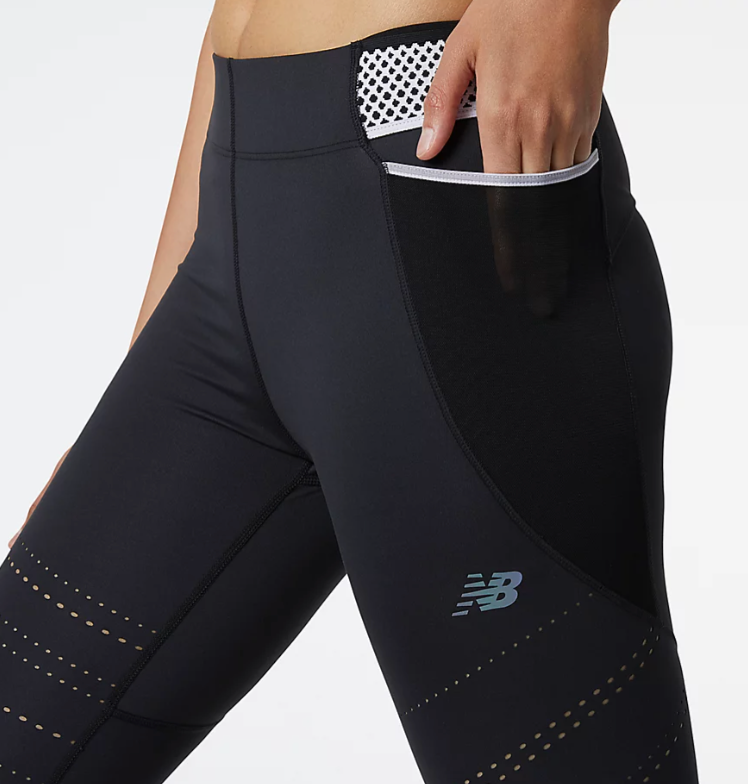 Women's New Balance Q Speed Tights. Black. Lateral view.